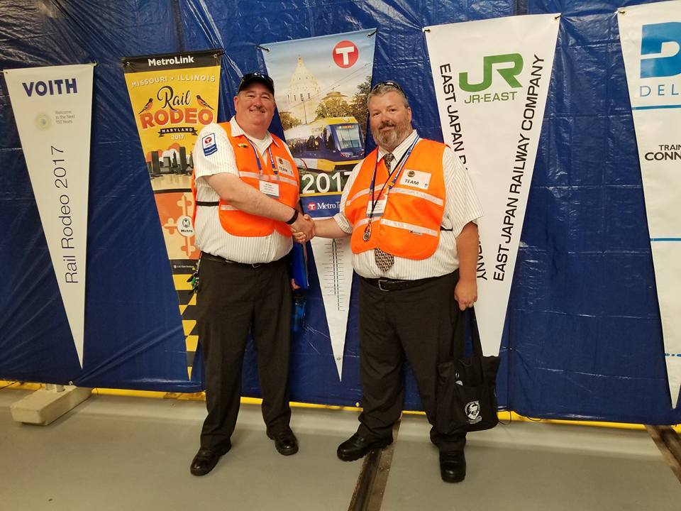 Train operators Peter Mooers, left, and Bill Morris, right, took fourth place in the American Public Transit Association’s International Rail Rodeo held earlier this month in Baltimore, Md. Train operators Peter Mooers, left, and Bill Morris, right, took fourth place in the American Public Transit Association’s International Rail Rodeo held earlier this month in Baltimore, Md.