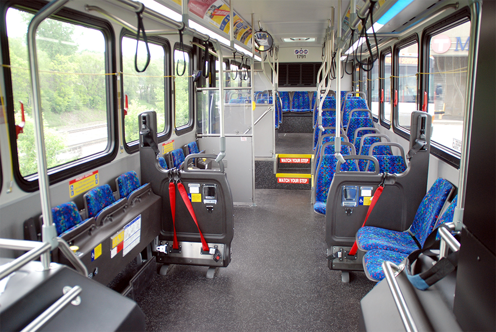 Metro Transit's newest buses replace three rows of front-facing seats on the passenger side with a single row of inward facing seats that customers can put in the up or down position. Metro Transit's newest buses replace three rows of front-facing seats on the passenger side with a single row of inward facing seats that customers can put in the up or down position.