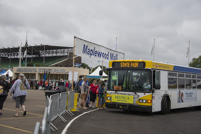 Customers exit Metro Transit express buses at the Minnesota State Fair. Customers exit Metro Transit express buses at the Minnesota State Fair.